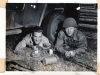 2-Soldiers-Sitting-Beneath-Vehicle