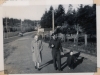 Man-in-Uniform-Walking-with-Wife-and-a-Child-Holding-its-Hand